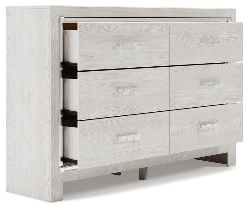 Open-angle view of the Ashley Furniture Altyra Dresser with multiple drawers and modern design, in a well-lit room setting.