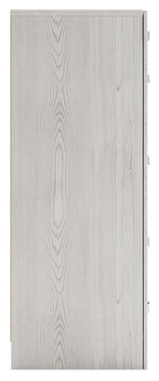 Ashley Furniture Altyra Dresser with sleek wooden finish and multiple drawers, shown from a side angle.