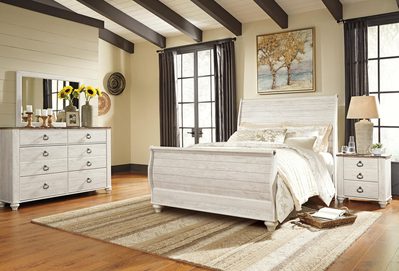 Ashley Furniture Willowton bedroom set with a wooden bed frame, matching nightstands, and a dresser in a cozy bedroom setting.