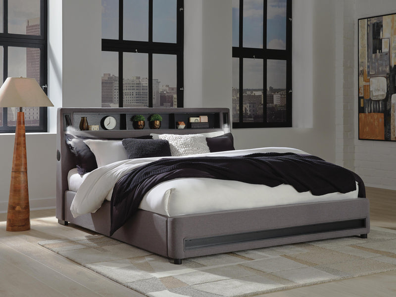 Ashley Furniture Verishaw upholstered bed with reading light, featuring a plush fabric headboard and modern design.