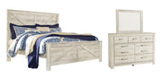 Ashley Furniture Bellaby bedroom set including a bed frame, nightstands, and dresser in a modern bedroom style.