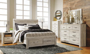 Ashley Furniture Bellaby Bed in dark wood finish with a classic headboard and sturdy frame.