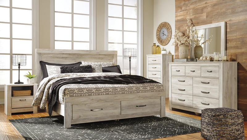 Ashley Furniture Bellaby bed with two storage drawers, showcasing a modern bed frame with sleek design and storage space.