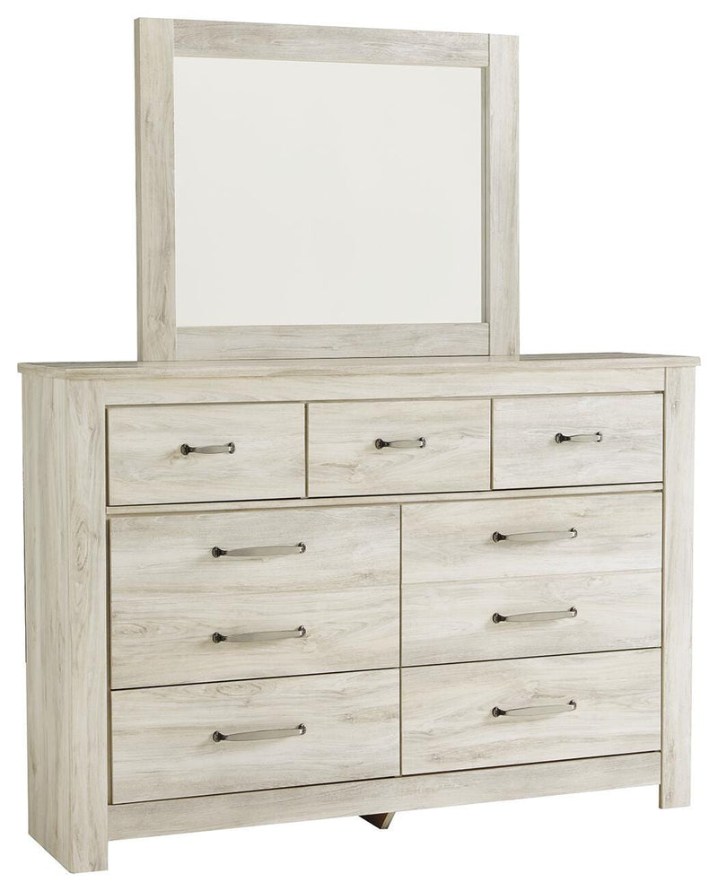Ashley Furniture Bellaby bedroom set featuring a bed frame, dresser, and nightstands in a modern bedroom scene.