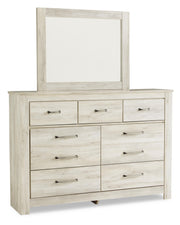 Ashley Furniture Bellaby bedroom set with a bed, nightstands, and dresser in a modern design, featuring neutral tones and stylish finishes.