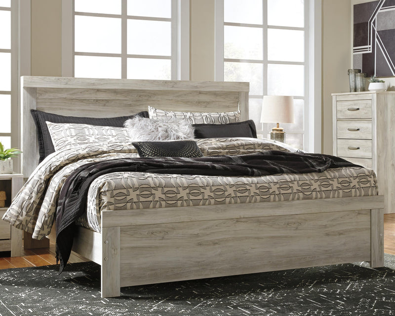 Ashley Furniture Bellaby bedroom set with a wooden bed frame, matching nightstands, and a cozy, stylish bedroom arrangement.