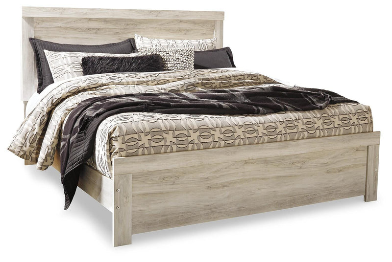 Ashley Furniture Bellaby bedroom set with a dark wood finish, including a bed frame, dresser, and nightstands.