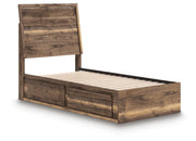 Ashley Furniture Chirason Bed showcasing a modern wooden bed frame with a sleek, angled headboard in a bedroom setting.