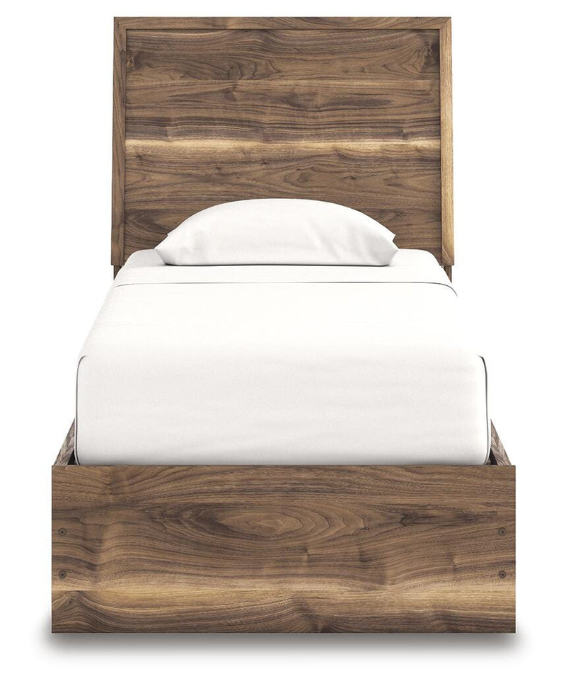 Ashley Furniture Chirason Bed with a headboard featuring a dark wood finish and modern design, shown in a bedroom setting.