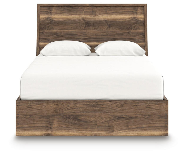 Ashley Furniture Chirason Bed with a wooden headboard and frame in a rich finish, showcasing elegant design and sturdy construction.