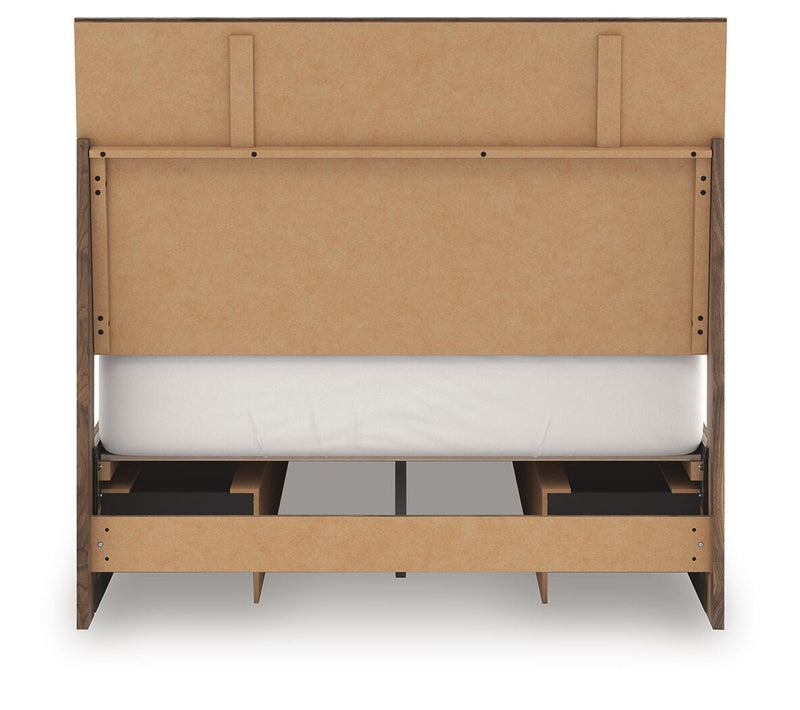 Ashley Furniture Chirason Bed with upholstered headboard and wooden frame, shown in a stylish bedroom setting.