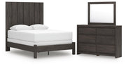 Ashley Furniture Fraluna bedroom set with a modern bed frame, matching nightstands, and bedroom furniture in a stylish design.