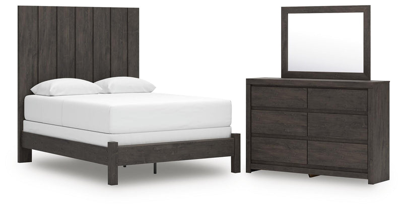 Ashley Furniture Fraluna bedroom set with a modern bed frame, matching nightstands, and bedroom furniture in a stylish design.
