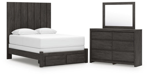 Ashley Furniture Fraluna bedroom set with a bed, nightstands, and dresser in a modern, elegant bedroom scene.