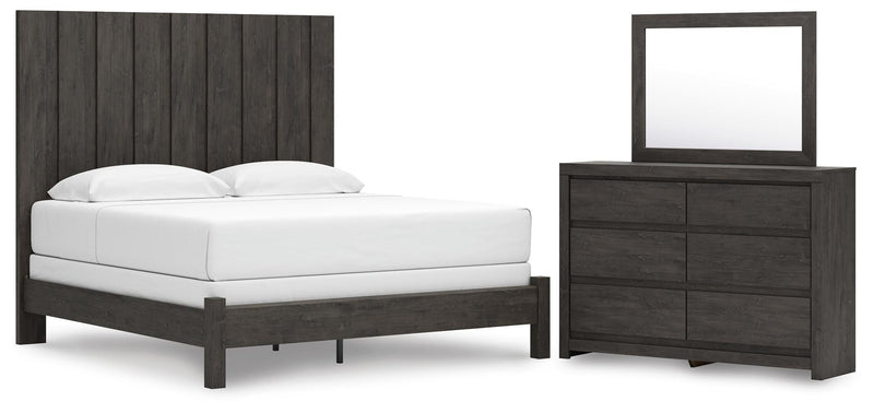 Ashley Furniture Fraluna bedroom set featuring a bed, matching nightstands, and dresser in a modern design with neutral finishes.