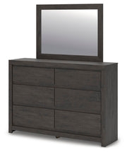 Ashley Furniture Fraluna bedroom set with a bed, nightstands, and dresser in a modern design, shown from an angled view.