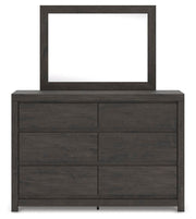 Ashley Furniture Fraluna bedroom set with a headboard, nightstands, and matching bedroom furniture in a modern design.