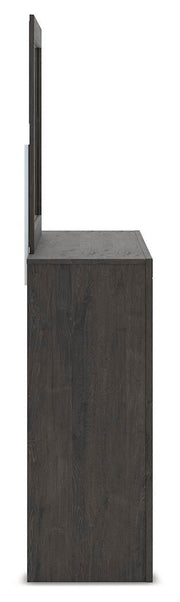 Ashley Furniture Fraluna bedroom set featuring a stylish bed frame, matching nightstands, and modern decor elements.