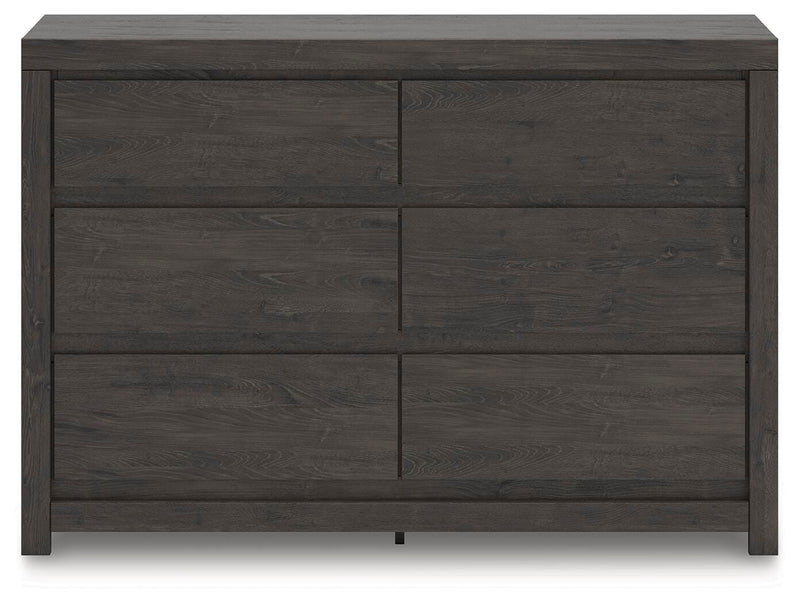 Ashley Furniture Fraluna dresser with six drawers and sleek wood finish, shown from the front.