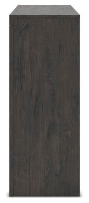 Ashley Furniture Fraluna dresser with multiple drawers, showcasing a sleek, modern design and dark wood finish.
