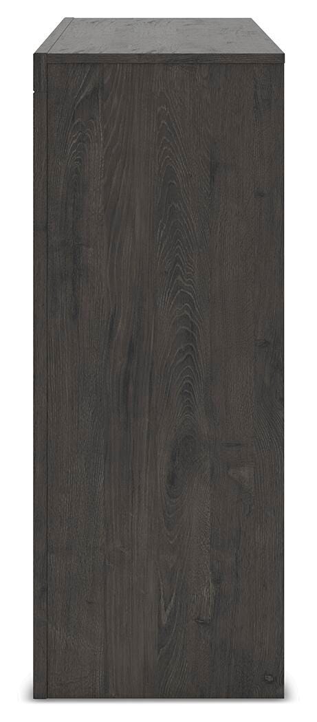 Ashley Furniture Fraluna dresser with multiple drawers, showcasing a sleek, modern design and dark wood finish.