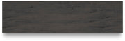 Ashley Furniture Fraluna dresser with sleek wooden top and modern design, featuring multiple drawers for storage.