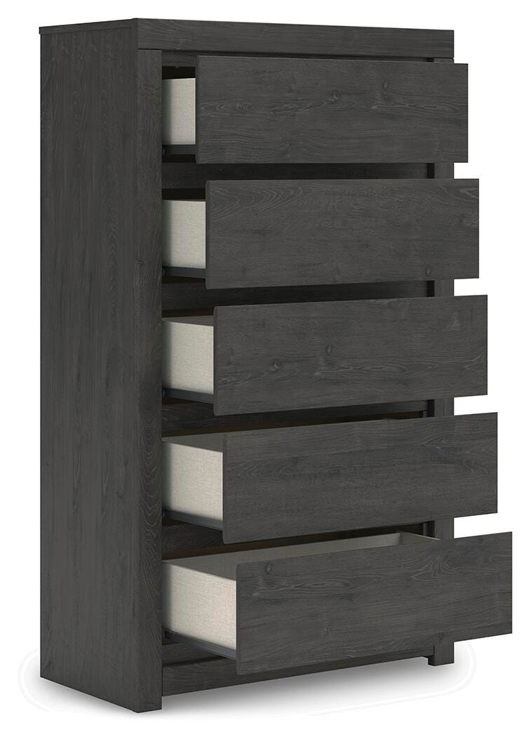 Open-angle view of Ashley Furniture Fraluna chest of drawers showing multiple drawers and wooden finish.