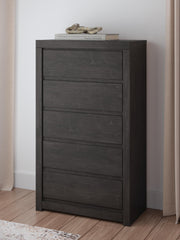Ashley Furniture Fraluna chest of drawers, wooden bedroom storage unit with multiple drawers and modern design.