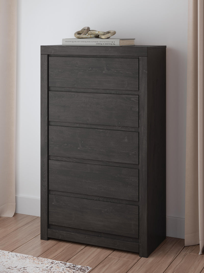 Ashley Furniture Fraluna chest of drawers, wooden bedroom storage unit with multiple drawers and modern design.