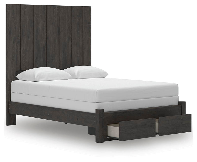 Ashley Furniture Fraluna bedroom set with a modern bed frame, nightstands, and dresser in a stylish bedroom scene.
