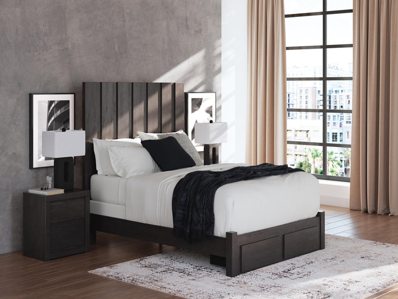 Ashley Furniture Fraluna bedroom set featuring a bed frame, matching nightstands, and dresser in a modern bedroom design.
