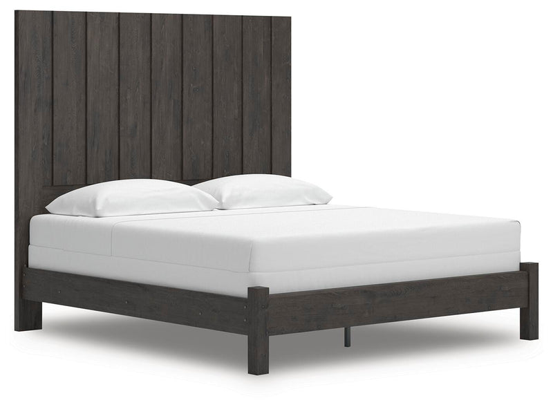 Ashley Furniture Fraluna bedroom set with a stylish bed, matching nightstands, and a cozy, modern bedroom design.