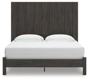 Ashley Furniture Fraluna bedroom set featuring a modern bed frame with matching nightstands and dresser in a stylish bedroom.