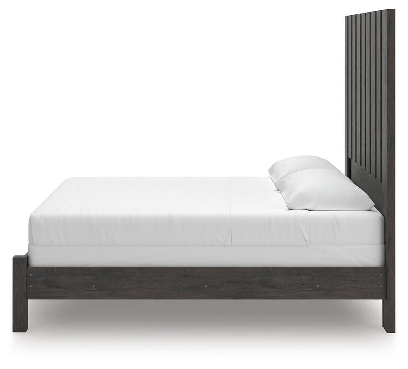 Ashley Furniture Fraluna bedroom set featuring a bed frame, nightstands, and matching dresser with modern design and neutral finish.