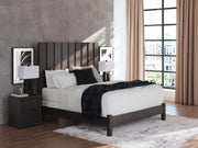 Ashley Furniture Fraluna bedroom set with a bed, matching nightstands, and dresser in a modern design.