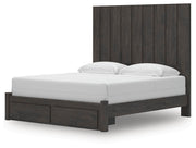 Ashley Furniture Fraluna bedroom set with a bed, nightstands, and dresser in a modern design, shown from an angled view.