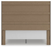 Ashley Furniture Fraluna bedroom set includes a bed, nightstands, and dresser with a modern design in a stylish bedroom scene.