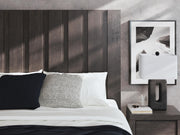 Ashley Furniture Fraluna bedroom set with a modern bed frame and matching nightstands, shown with a stylish bedroom interior.