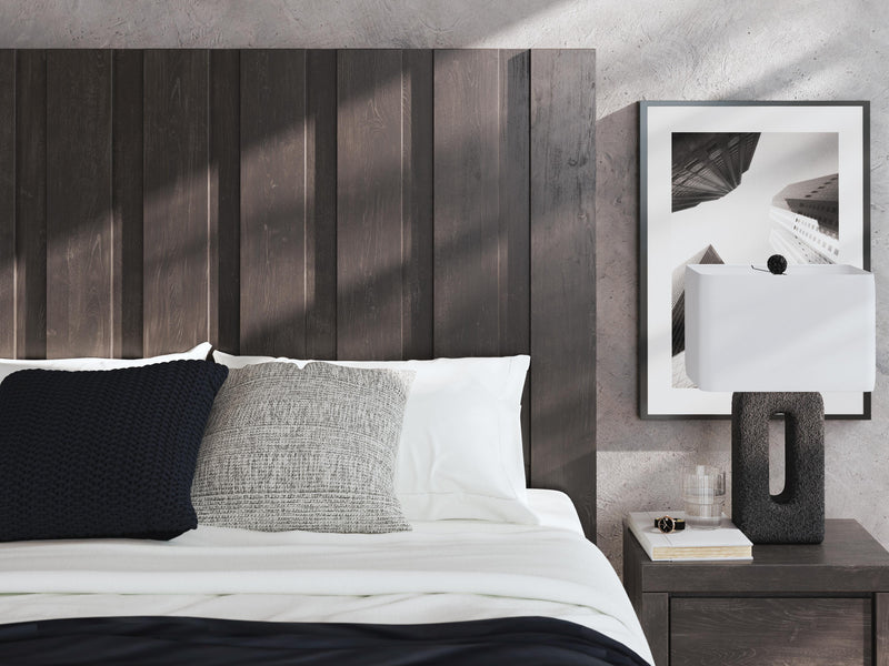 Ashley Furniture Fraluna bedroom set with a modern bed frame and matching nightstands, shown with a stylish bedroom interior.