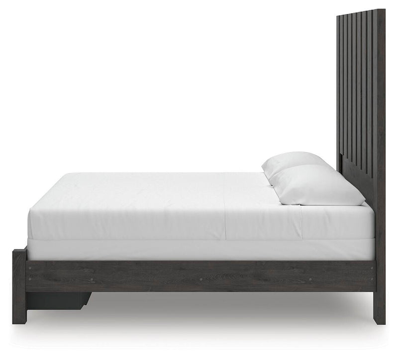 Ashley Furniture Fraluna bedroom set featuring a bed, nightstands, and dresser with modern design and warm wood finish.