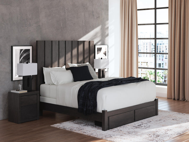 Ashley Furniture Fraluna bedroom set with a bed, nightstands, and dresser in a modern bedroom design.