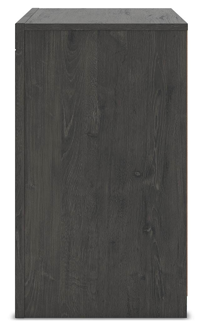 Ashley Furniture Fraluna bedroom set with a bed, nightstands, and dresser in a modern, stylish bedroom design.