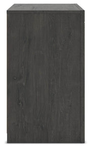 Ashley Furniture Fraluna bedroom set with a bed, nightstands, and dresser in a modern bedroom scene.