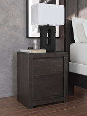 Ashley Furniture Fraluna bedroom set featuring a bed, matching dresser, and nightstands with a modern design and neutral finish.
