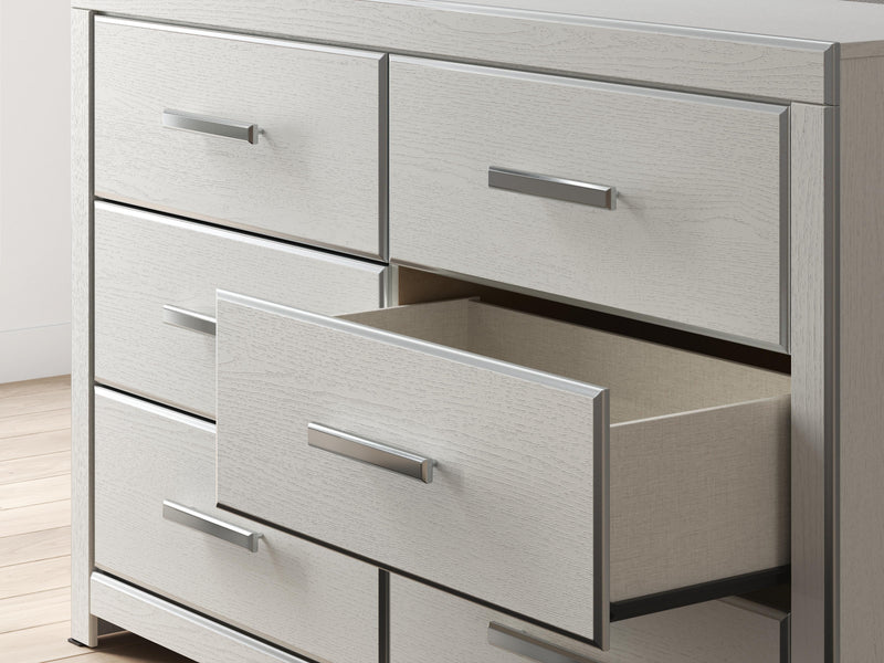 Ashley Furniture Zuraleus dresser and mirror set featuring a sleek wooden dresser with a matching rectangular mirror.