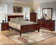 Ashley Furniture Alisdair nightstand with wood finish, featuring a single drawer and a lower shelf for storage.
