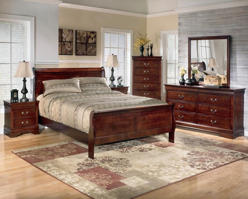 Ashley Furniture Alisdair nightstand with wood finish, featuring a single drawer and a lower shelf for storage.