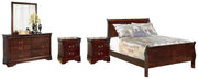 Ashley Furniture Alisdair bedroom set with a queen-sized bed, matching nightstands, dresser, and mirror in a modern design.