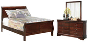 Ashley Furniture Alisdair bedroom set with a modern bed frame, matching nightstands, and dresser in a stylish bedroom setup.