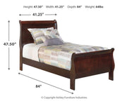 Ashley Furniture Alisdair bedroom set with a modern bed frame, matching nightstands, and a coordinated dresser in a stylish bedroom scene.